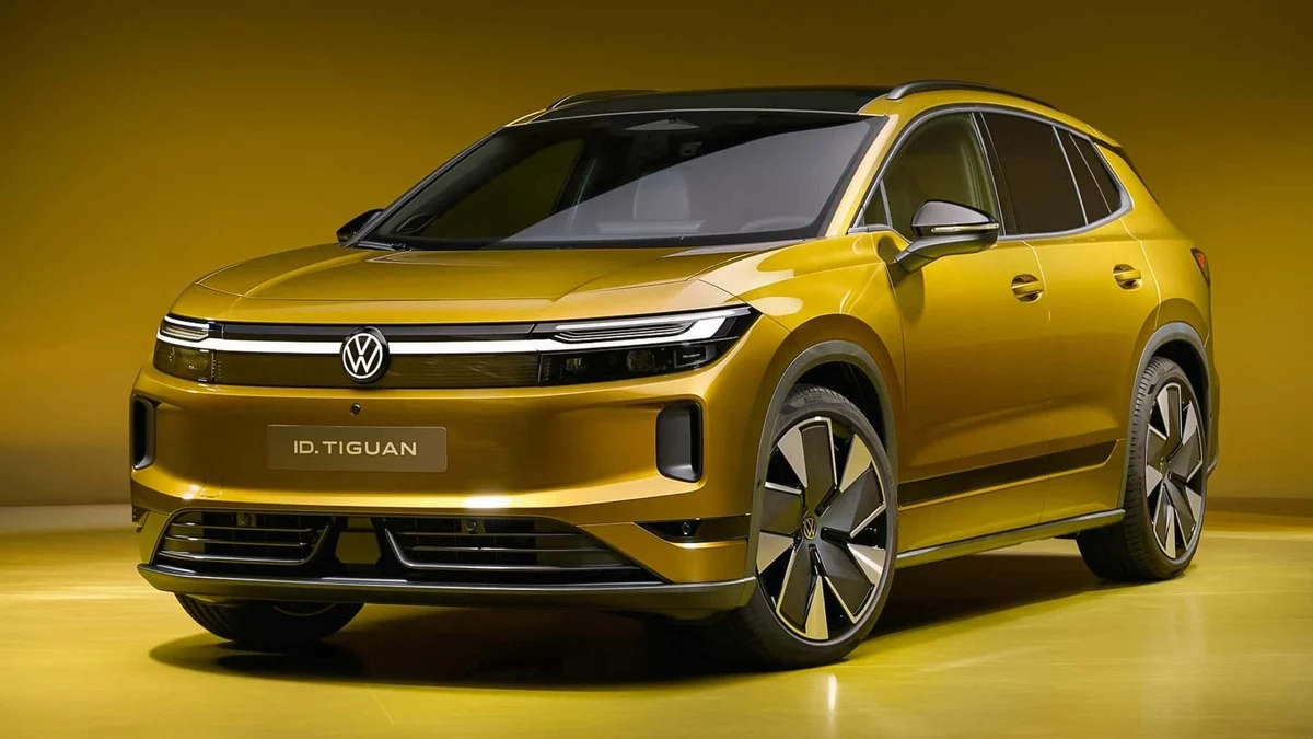 Volkswagen ID. Tiguan estacionado sob holofotes de estúdio exibindo faróis acesos